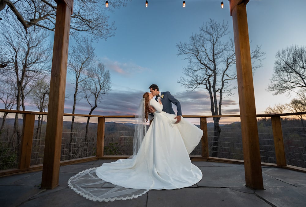 The Best North Carolina Wedding Venues 9 Couple getting married at the Orchard Inn, one of the best North Carolina wedding venues