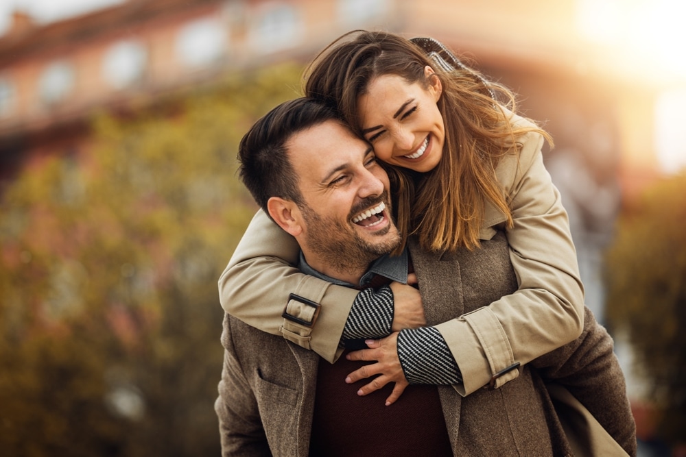 Young couple enjoying a fall getaway to one of the most romantic getaways in NC