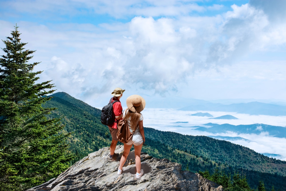 Couple hiking and enjoying romantic getaways in Asheville, NC