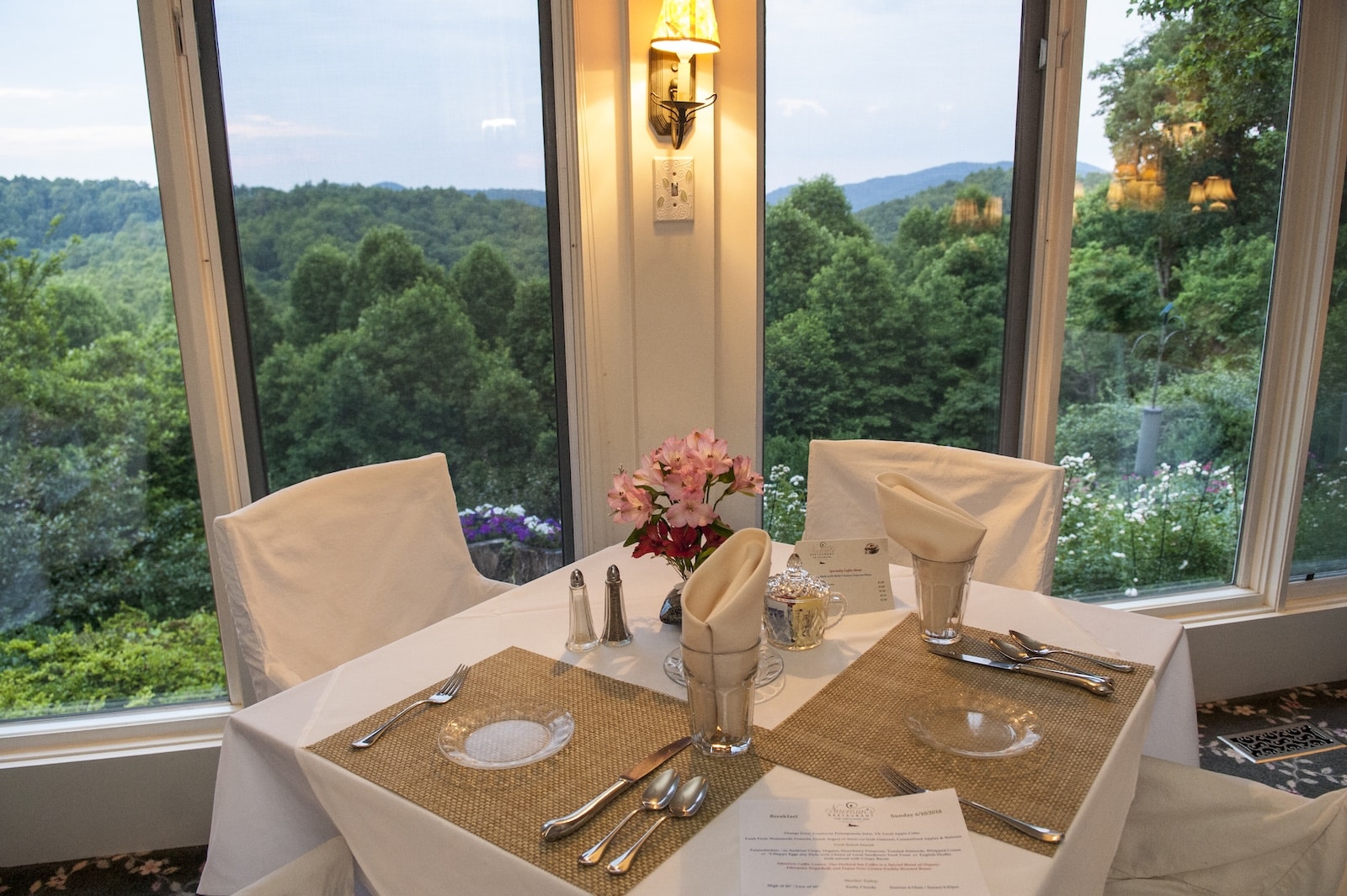 A table set for two against the backdrop of the Blue Ridge Mountains at the best Bed and Breakfast Saluda NC.