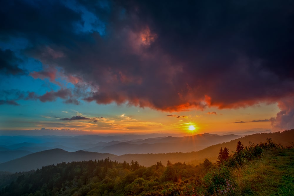 A Couples Getaway for Fall in North Carolina 1 Dramatic sunrise over the gorgeous Blue Ridge Mountains during fall in North Carolina