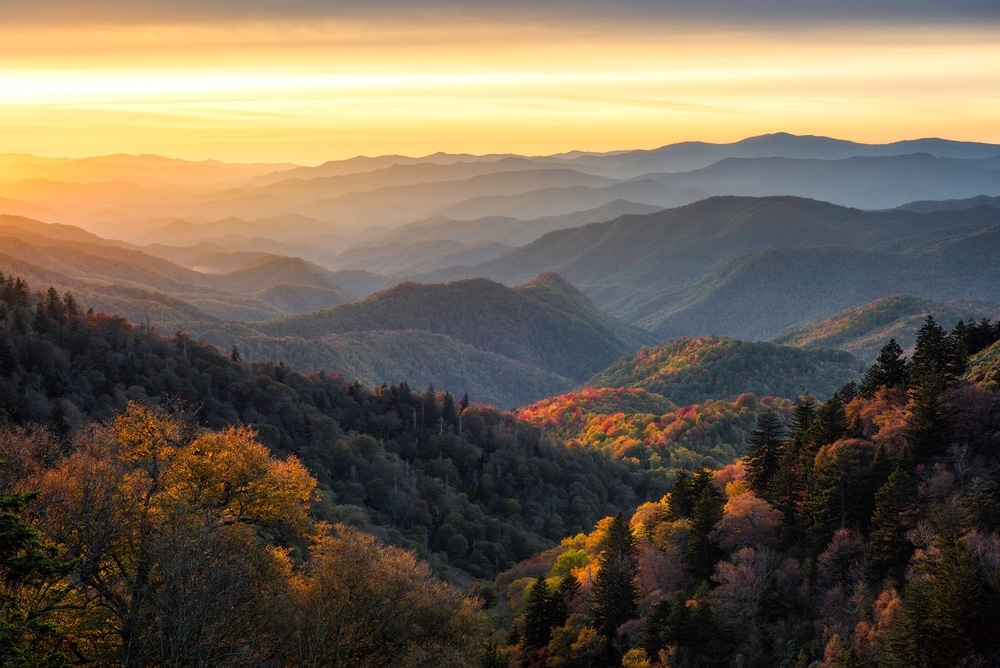 One of the Best Weekend Getaways in the South 1 Check out on of the best weekend getaways in the South at our luxury inn. Iamge of the Great Smoky Mountains, with fall foliage and setting sun.