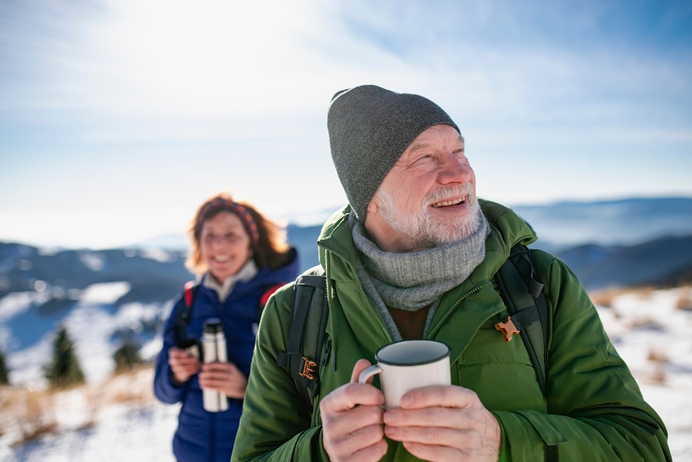 The Best Hikes Near Asheville in the Winter 1 Senior couple enjoying winter hikes near Asheville in the Western North Carolina mountains