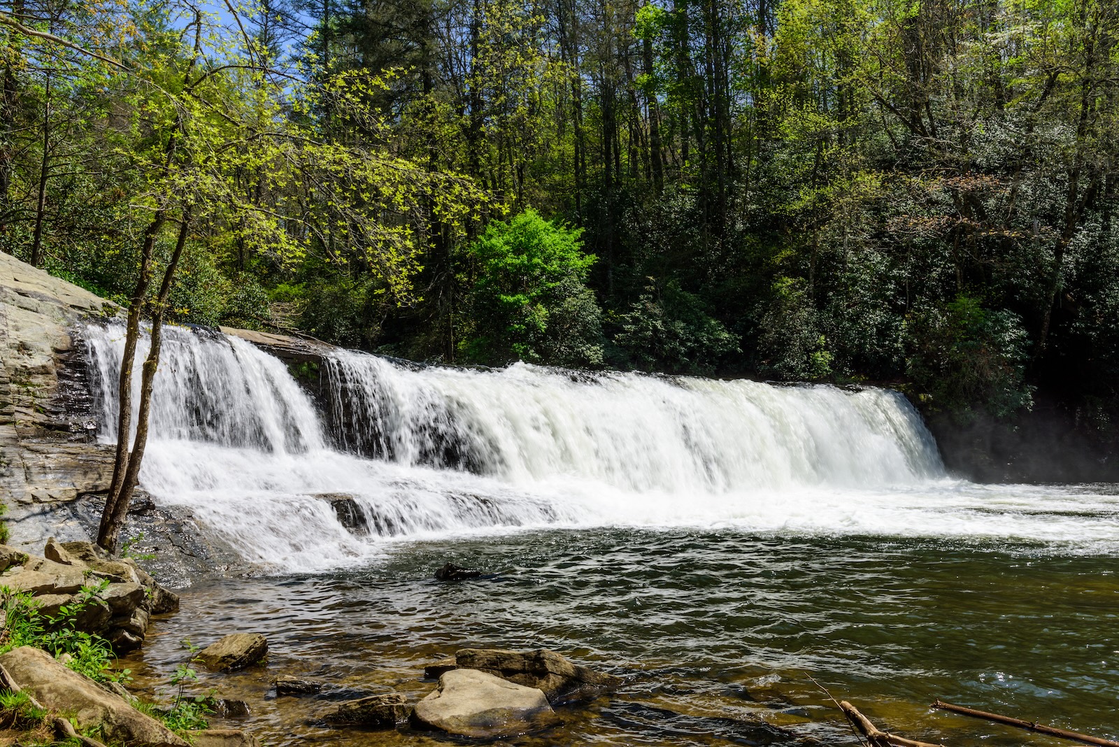 Hike to Triple Falls in Western North Carolina 1 Hooker Falls, along with Triple Falls, are some of the best waterfalls in Dupont State Recreational Forest.